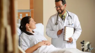 Doctor in room with patient