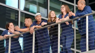 AdventHealth nurses standing together on a walkway