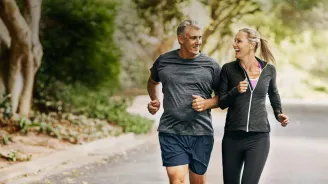 Man and woman jogging outdoors