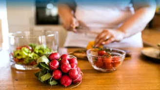 Woman chopping vegetables
