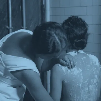 Ellen White helping to bathe a patient