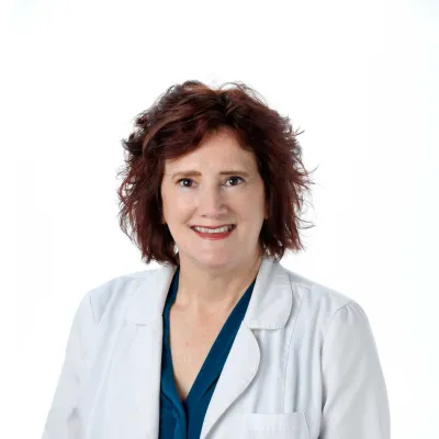 Professional headshot of Carol Austin