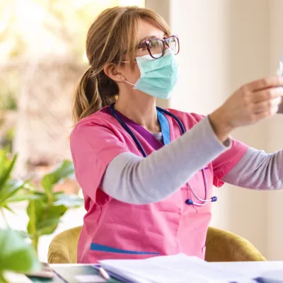 A doctor reviews the results of an imaging test. 