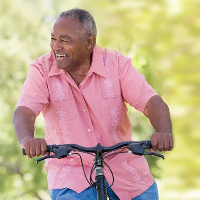middle-aged-man-ridding-a-bike