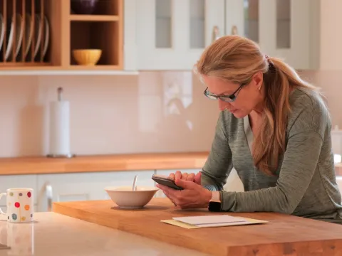 A woman at home.